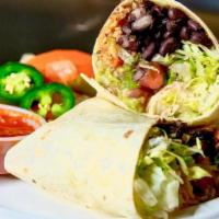 Veggie Burrito · Mexican rice, vegetarian black beans, jack cheese, lettuce, guacamole, pico de gallo salsa a...