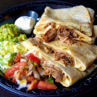 Roasted Pork Quesadilla · Roasted pork with melted jack cheese. Served with pico de gallo, guacamole and sour cream.