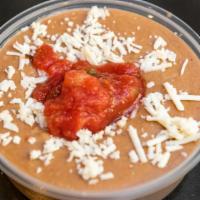 Refried Pinto Beans · Traditional mexican pinto beans cooked for 3 hours then refried and mashed with bacon for a ...