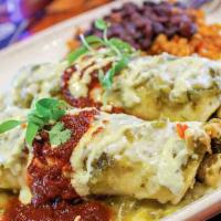 Chicken Enchiladas · organic chicken, roasted vegetables, chihuahua cheese, poblano crema. served with black bean...