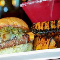 Green Chili Bison Burger · caramelized onions, green chili relish, chihuahua cheese, green chile mayo.

This item may b...
