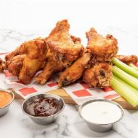 Rebel'S Original Wings (20-Pc Pack) · 20 crisp fried golden-brown wings tossed in the sauce of your choice