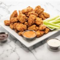 Boneless Wings (20-Pc Pack) · 20 boneless chicken wings tossed in your choice of sauce