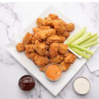 Boneless Wings (40-Pc Pack) · 40 boneless chicken wings tossed in your choice of sauce