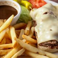 French Dip · Thinly sliced choice roast beef on French bread with au jus.