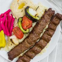 Lula Kabob Plate · Spiced and marinated ground beef, comes with any two side orders and pita bread.
