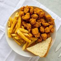 Popcorn Chicken · With French fries.