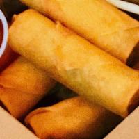 Crunchy Veggie Egg Rolls (Popular Seller!) (V) · 4 Crunchy fried egg rolls with snap peas, cabbage & carrots filling. Served with sweet chili...