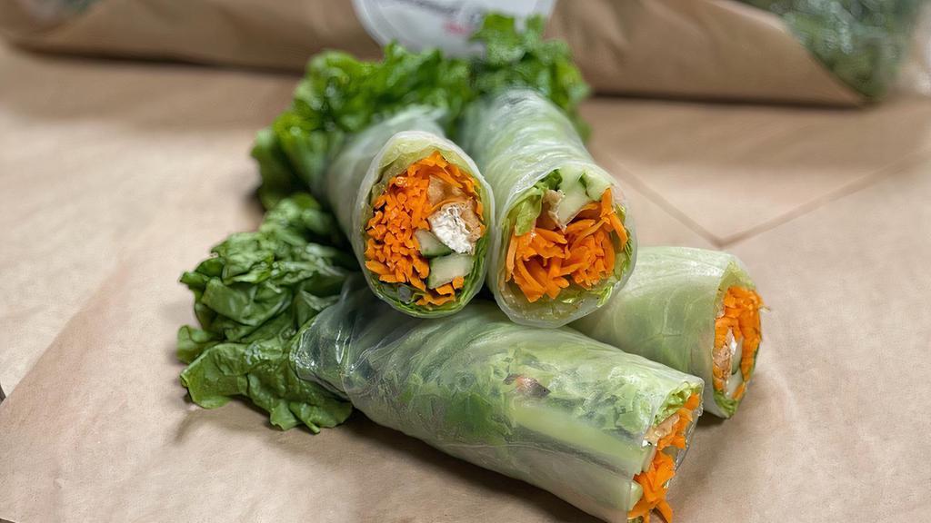 Vietnamese Spring Rolls (Popular Seller!) (V) · 4 halves rice paper wrapped tofu, lettuce, cucumber, carrot serve with roasted peanut sauce. It's refreshing, healthy & light.