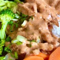 Katsu Curry Chicken (Thai Style) · Crispy breaded & fried boneless chicken served over rice with carrots, broccoli, topped with...
