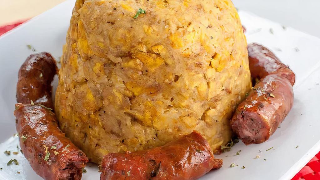 Longaniza Mofongo · * Guest with allergies should inform their server prior to ordering. Consuming de raw or undercooked meats, poultry, seafood, or eggs, may increase your risk de foodborne illness. Mashed plantain with Dominican Sausage, garlic and butter.