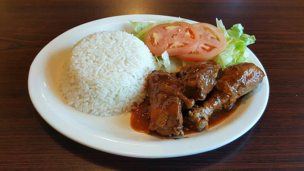 Chicken Stew · * Guest with allergies should inform their server prior to ordering. Consuming de raw or undercooked meats, poultry, seafood, or eggs, may increase your risk de foodborne illness. Dominican stewed chicken.