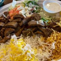 Gyro Platter · Specially seasoned lamb and beef gyro, topped with feta cheese.