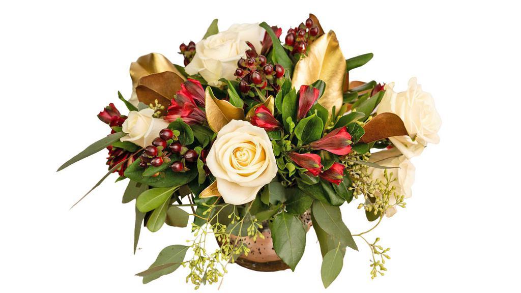 Garden Of Spackles  · This beautiful arrangement will spackle  the eyes of anyone receiving during the holidays season. Beautiful selections of green pittosporum, gold magnolia, eucalyptus,  hypericum, alstroemeria and vendela white roses.