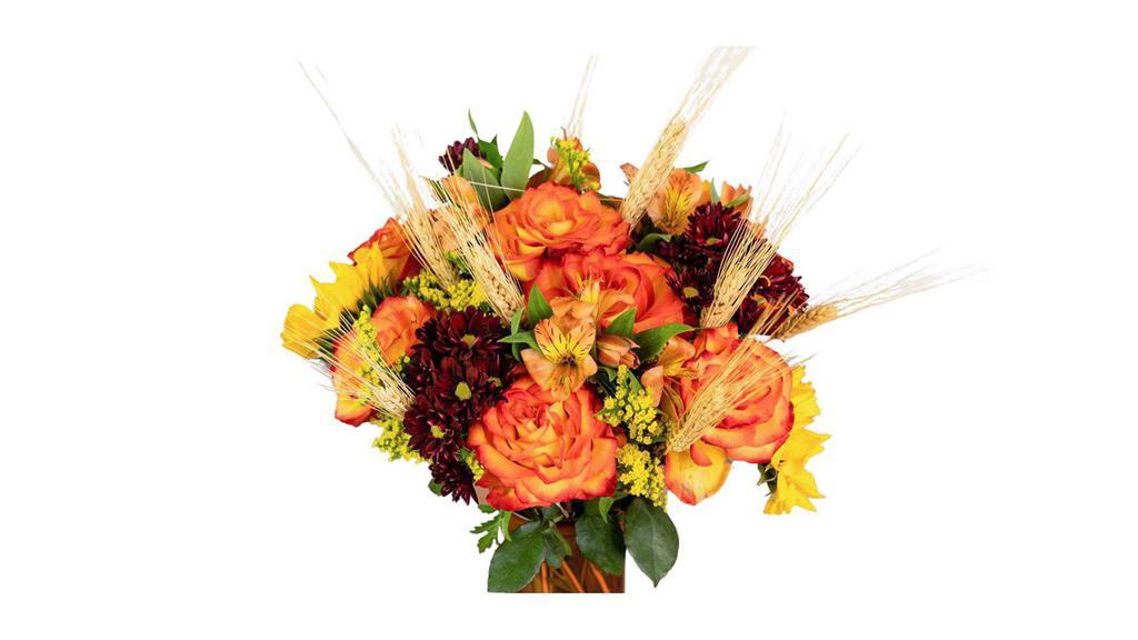 The Sunset · How pleasant it is to see the sunset right before your eyes.  This sunset bouquet has   beautiful selections of sunflower, high magic roses, solidago, burgundy daisy's , orange alstroemeria and wheat natural bunches.