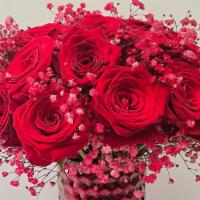 Forever My · Fabulously selected red roses, perfectly arranged and paired with red gypsophillia. This For...