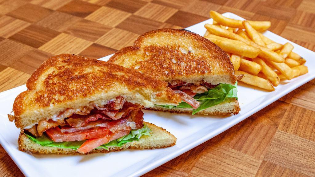 Classic Blt · Grilled challah bread, apple wood smoked bacon, mayo.