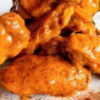15 Pcs. Traditional Wings · FRESH, CRISPY WINGS TOSSED IN YOUR FAVORITE SAUCE