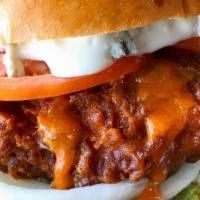 Buffalo Chicken Sandwich · GRILLED OR FRIED BUFFALO CHICKEN TOSSED IN. HOT SAUCE, TOPPED WITH BLUE CHEESE DRESSING,. LE...