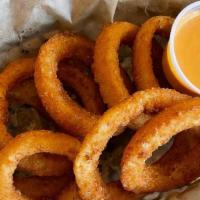 Onion Rings · BREADED ONION RINGS SERVED WITH SPICY RANCH
