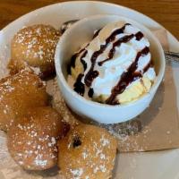 Fried Oreos · HAND BATTERED OREO COOKIES, DEEP FRIED AND SERVED WITH A SCOOP OF VANILLA ICE CREAM