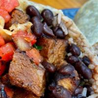Carne Asada Burrito · Our delicious black beans, rice, pico de gallo, red house salsa and our Carne Asada (seitan)...