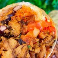 Pollo Burrito · Our delicious black beans, rice, pico de gallo, red house salsa and our Pollo (soy bean) wra...