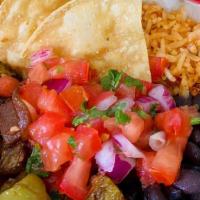 Veggie Bowl · Our black beans, rice, pico de gallo, and seasonal veggies in a bowl. All the goodness of th...