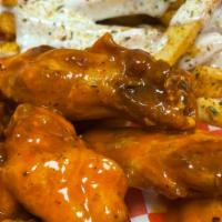 Wings & Fries (10) · Your choice of wing flavor with fries.