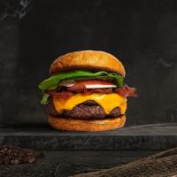 Bacon Of Hope Burger · Seasoned plant-based patty topped with melted vegan cheese, layers of crispy vegan bacon, le...
