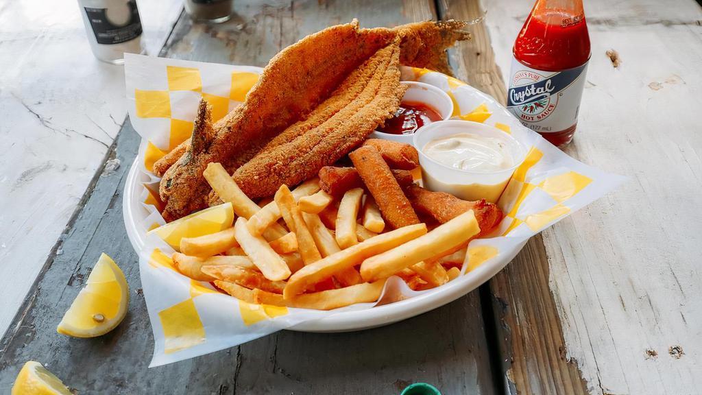Whole Catfish Basket · Includes: Fries, Hush Puppies (3), Ketchup & Tarter.