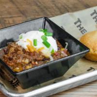 Brisket Chili · Kidney beans, corn, tomatoes and spices topped with sour cream, shredded cheese and green on...