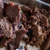 2 Meat Combos Platter · Selection of two smoked meats with two sides.
Feeds one - two people.