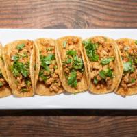 6 Mini Taco Plate · (Chicken, carnitas, or pastor) served with onions, cilantro, and lime on mini corn tortillas.