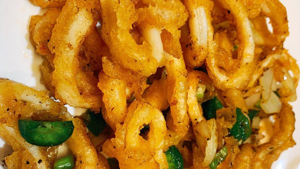 Salt Pepper Squid · Spicy. Lightly fried squid, quickly stirred with salt and pepper and fresh jalapeño.