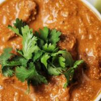 Lamb Kurma · Lamb cooked with a blend of yogurt, and spices in onion sauce.