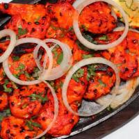 Shrimp Tandoori · Shrimp marinated in herbs & spices, skewered and cooked in clay oven.