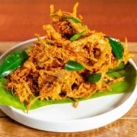 Uthiri Onion Pakoda · (Vegan) Julienne onions, masala powders, curry leaves, crushed garlic & besan flour; deep fr...