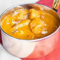 Murg Tikka Masala · (Contains dairy) Cubes of chicken char grilled and cooked in a creamy tomato sauce.