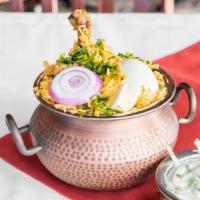 Dum Chicken Biryani · The perfect delicacy of made with the choicest cuts of chicken, dum cooked with saffron hued...