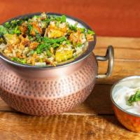 Banarasi Pulao · Aromatic basmati rice with seasonal vegetables and paneer, infused with mild spices and saff...