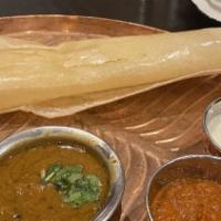 Dosa · (Vegan) Crispy rice lentil crepe served plain or sprinkled with spicy gun powder paired with...