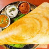 Ghee Roast Dosa · (Contains dairy) Crispy rice lentil crepe made with ghee, served with chutney and sambhar.