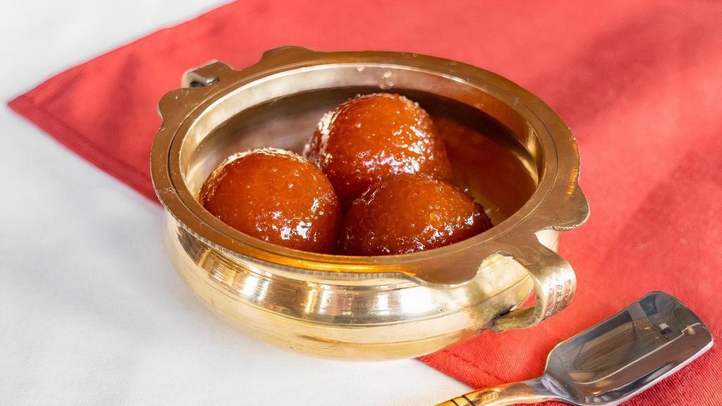 Gulab Jamun · Spongy deep fried dumplings made with flour & milk served in a rose infused syrup.