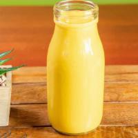Mango Lassi · Refreshing drink made with mango, yogurt & cane sugar.