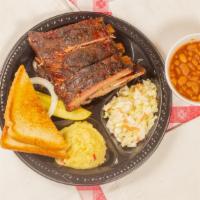 Pork Ribs Plate · Served with Texas toast, onion, pickle, and your choice of three sides.