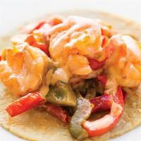 Camarones · Fajita-style shrimp, onions and bell peppers served with a mild chipotle sour cream.