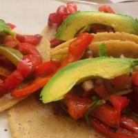 Vegan Peppers · Vegan. Bell peppers and onions sautéed with salsa fajita style topped with avocado and pico ...