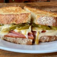 Cubanesque · Dearborn Smoked Ham, Swiss Cheese, Topor's Pickles, Honey Dijon, and Aioli on Toasted Italian