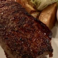 12Oz Ny Strip · Served with mashed potatoes and a choice of demi-glace or compound butter